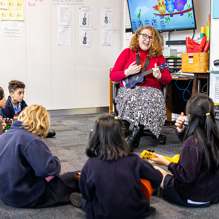 Dedicated Teacher from St Canice's Catholic Primary Katoomba playing Ukulele