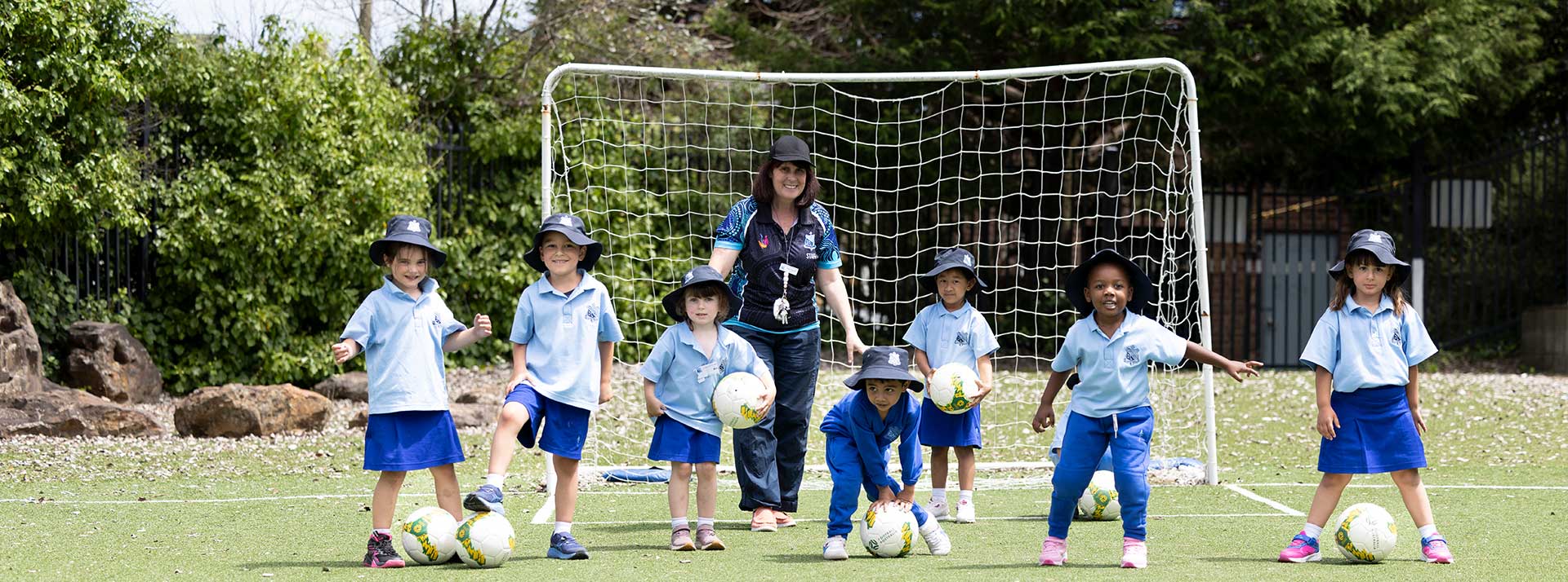 St Canice's Katoomba Kindy students playing soccer.