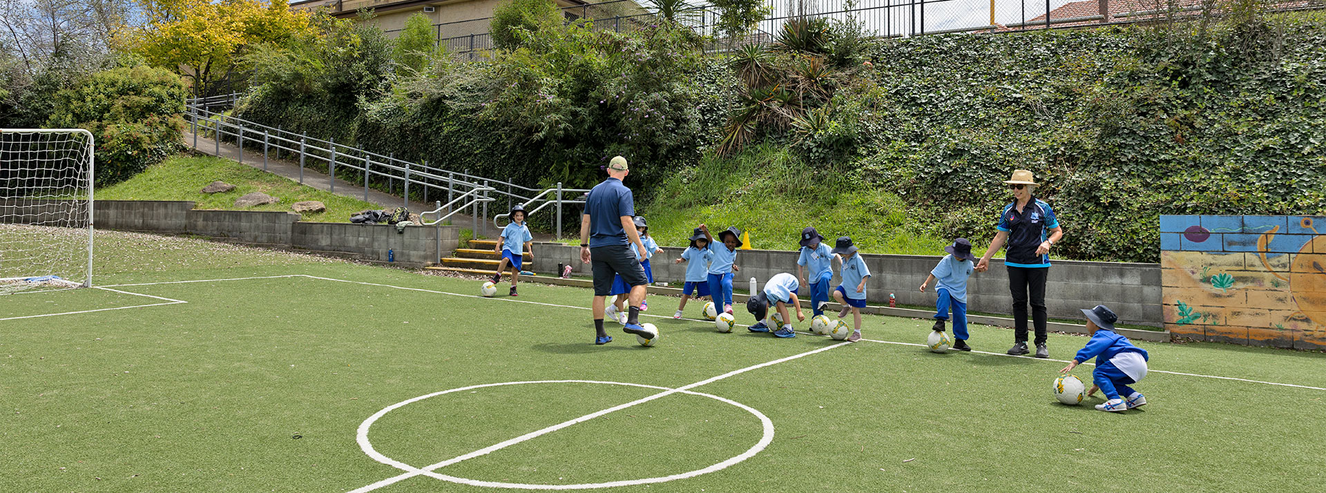 St Canice’s Primary Katoomba students playing on soccer oval