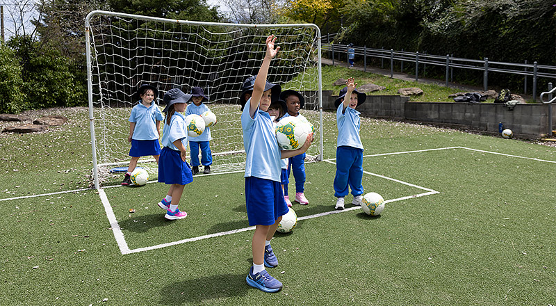 St Canice’s Primary Katoomba students playing on soccer oval