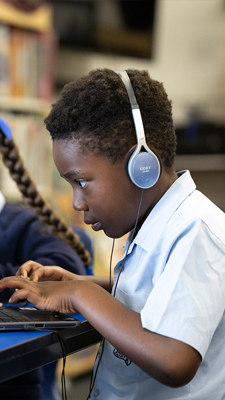 St Canice's Katoomba student using laptop and headphones