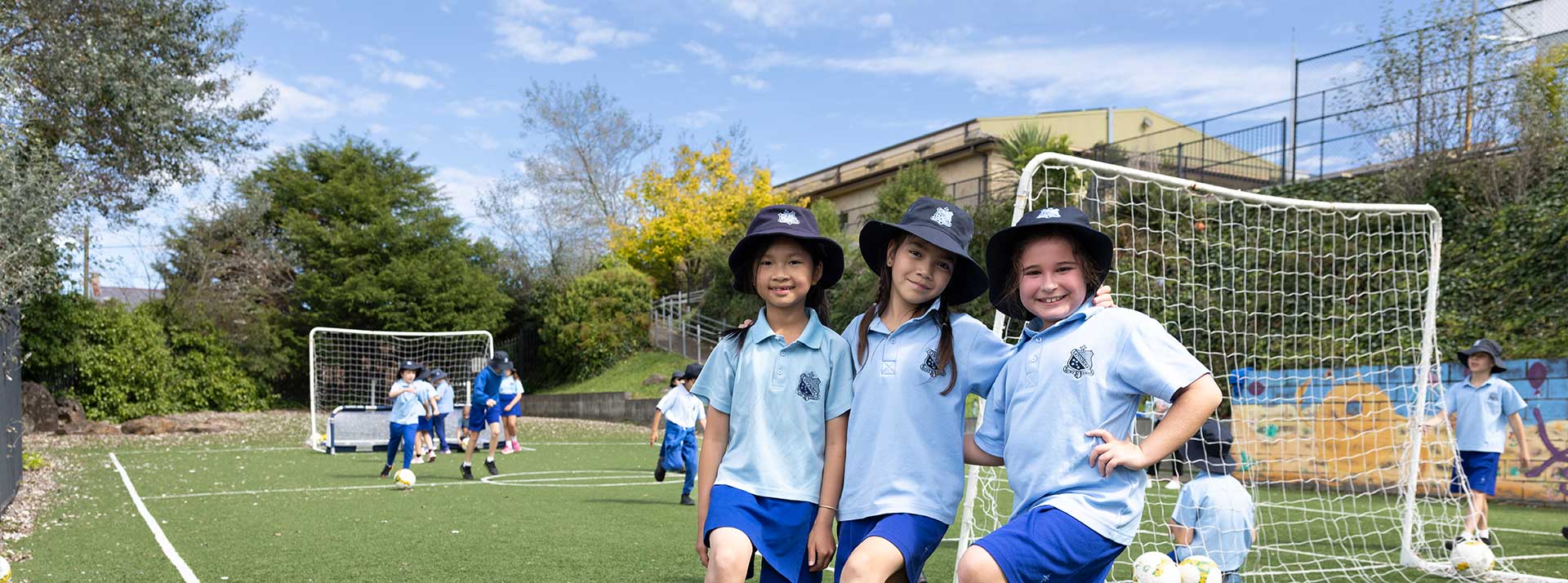 Students outdoors at St Canice's Katoomba playing soccer