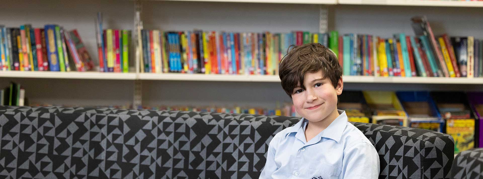 Student reading in St Canice’s Katoomba School Library
