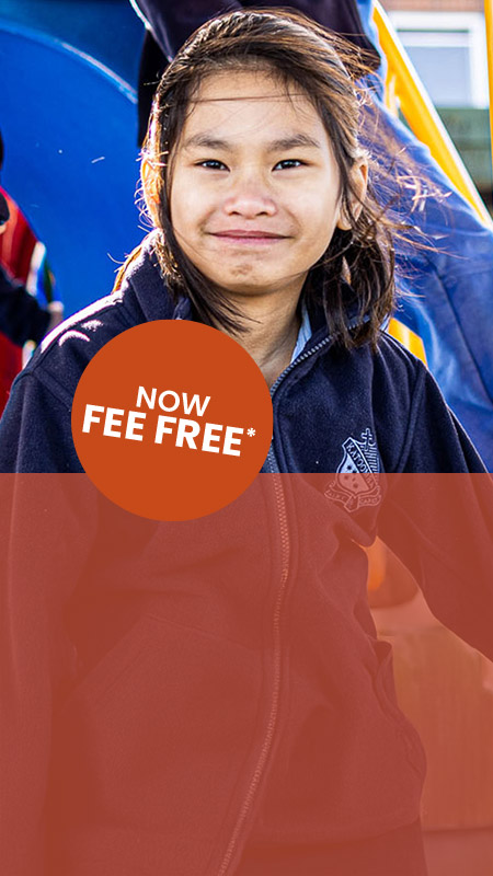 St Canice's Catholic Primary Katoomba student on playground equipment. We are now fee free