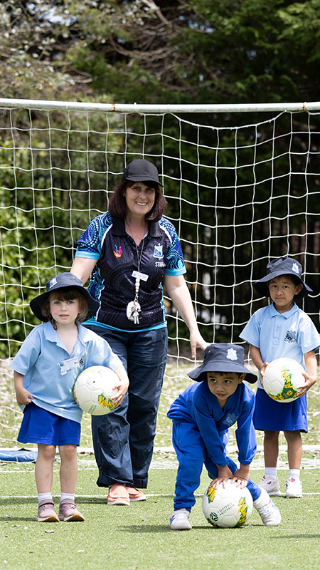 St Canice's Katoomba Kindy students playing soccer.