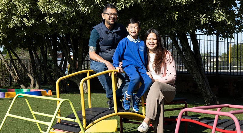 St Canice’s Katoomba parents and student on playground equipment
