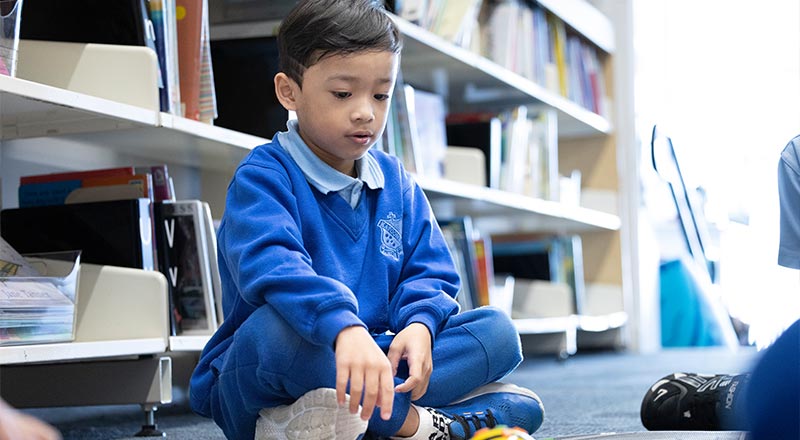 St Canice's Katoomba students in class, playing with toys